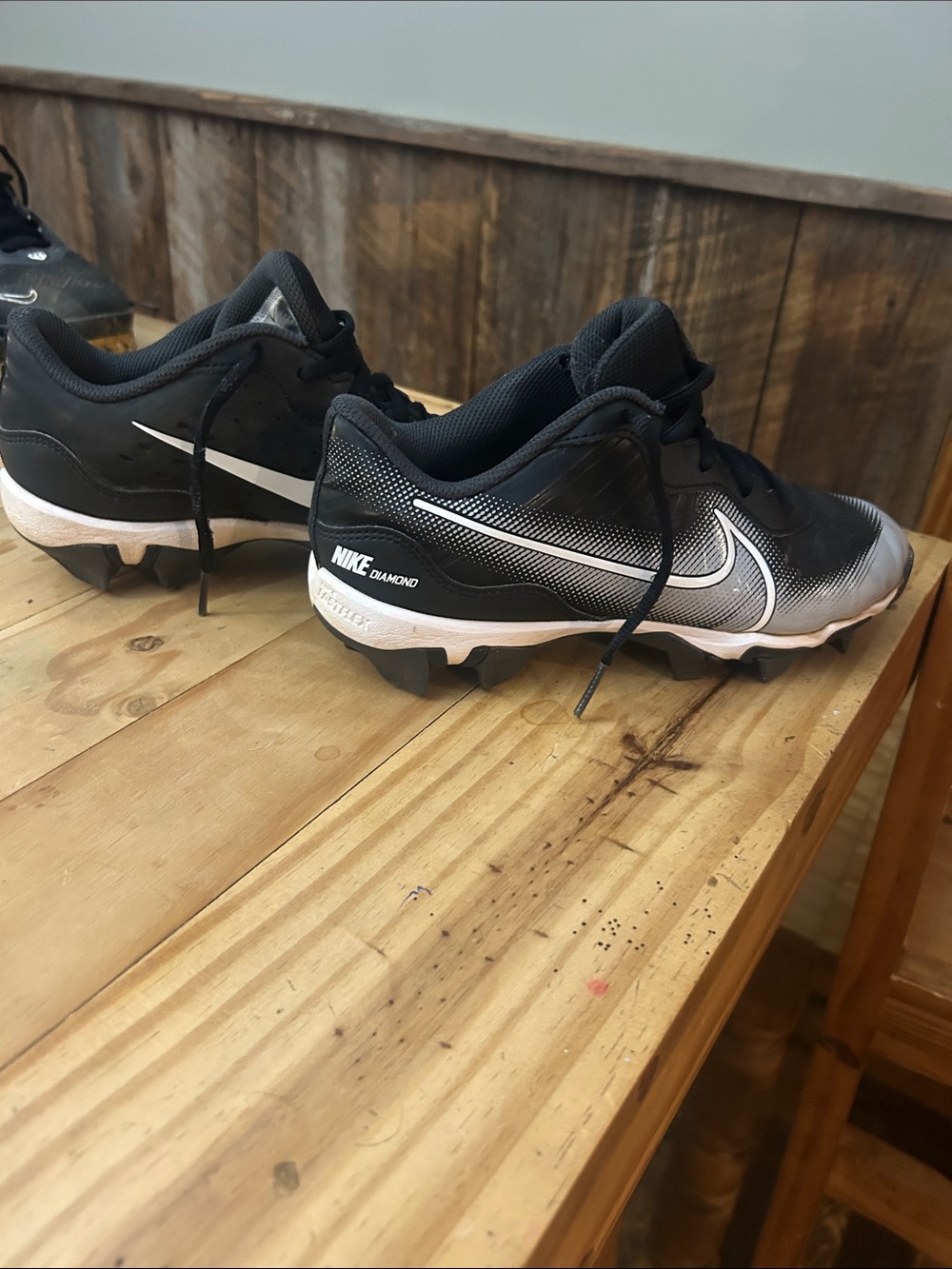 Nike Black and White Baseball Cleats with Swoosh